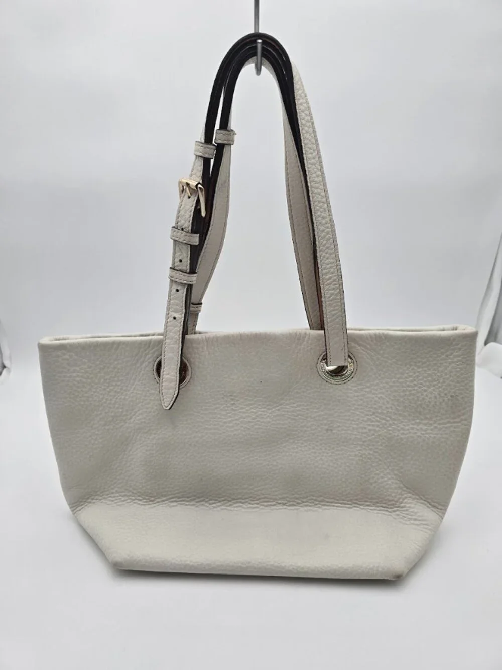 Dooney & Bourke Medium East West Grommet Shopper shoulder tote bag.